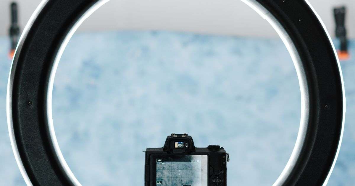 Camera setup with ring light in a studio, representing content creator and influencer insurance