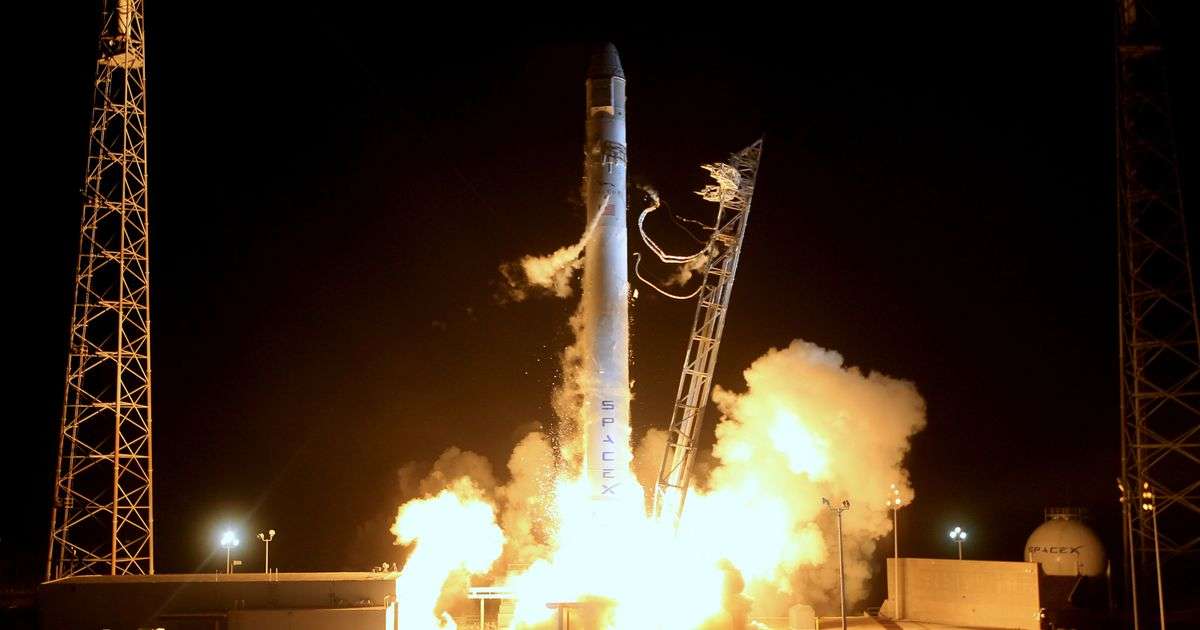 Night rocket liftoff with flames and smoke, representing space and satellite launch insurance